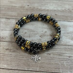 Jerusalem Brand Gunmetal and Tan Beaded Bracelet with Silver Charm
